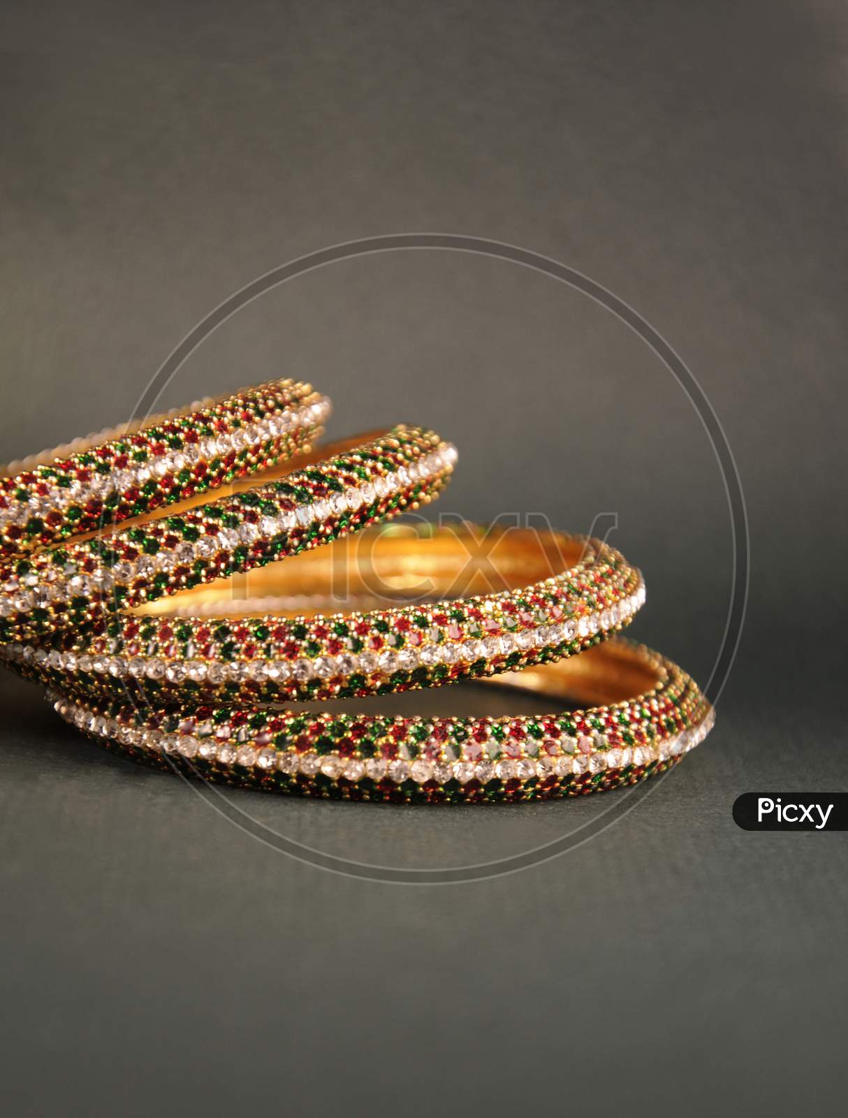 Green hot sale gold bangles