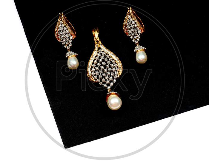 Diamond Jewelry Placed On Black And White Background With Earring, Diamond Pendant,Diamond Jewellery, Diamond Necklace