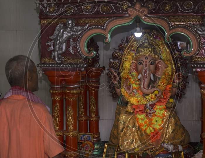 28Th March, 2021, Siliguri, West Bengal,India: A Prist Doing Worship Of God Ganesha.
