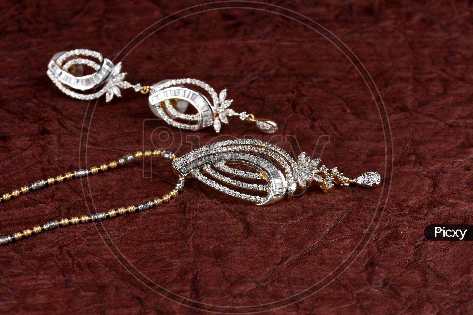 Diamond Jewelry Placed On Texture Background With Earrings Diamond Pendant,Diamond Jewellery
