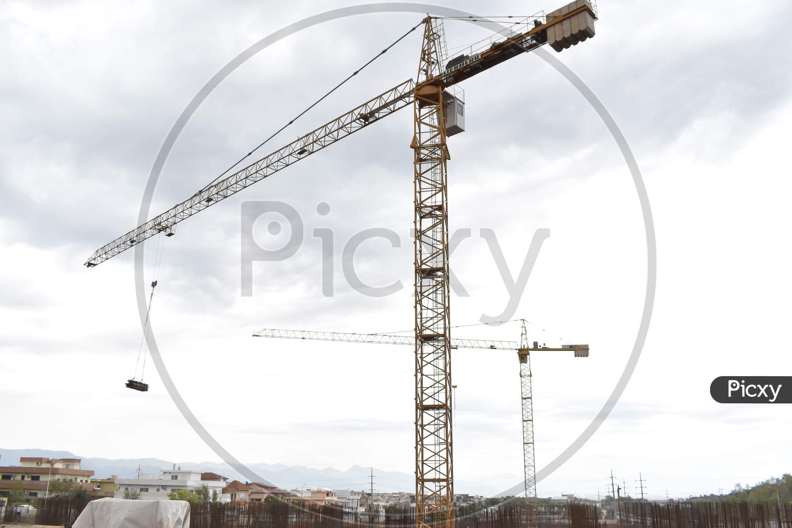 Construction site with cranes wide angle photograph