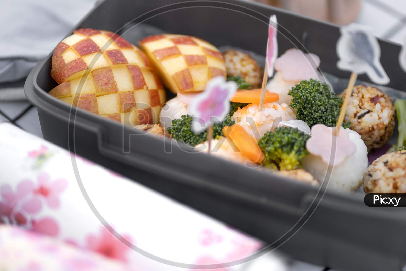 grilled salmon steak with vegetables, Delicious picnic with cherry tree flowers