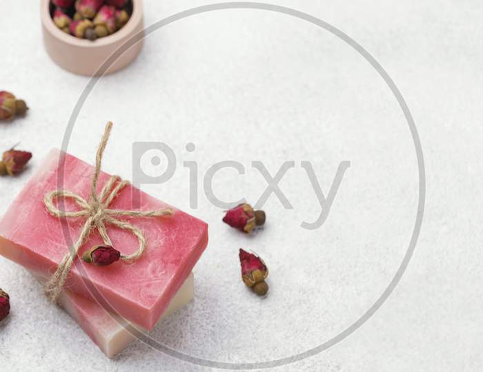 High angle homemade soap, accessories on a wooden background