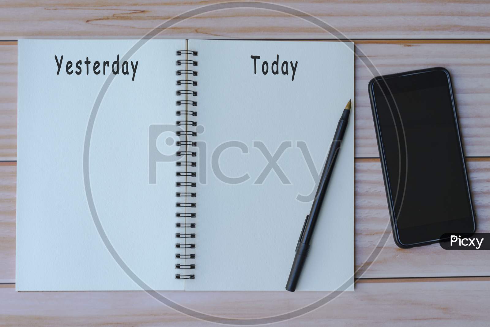 Yesterday And Today Written On Notepad. Flat Lay, Top View