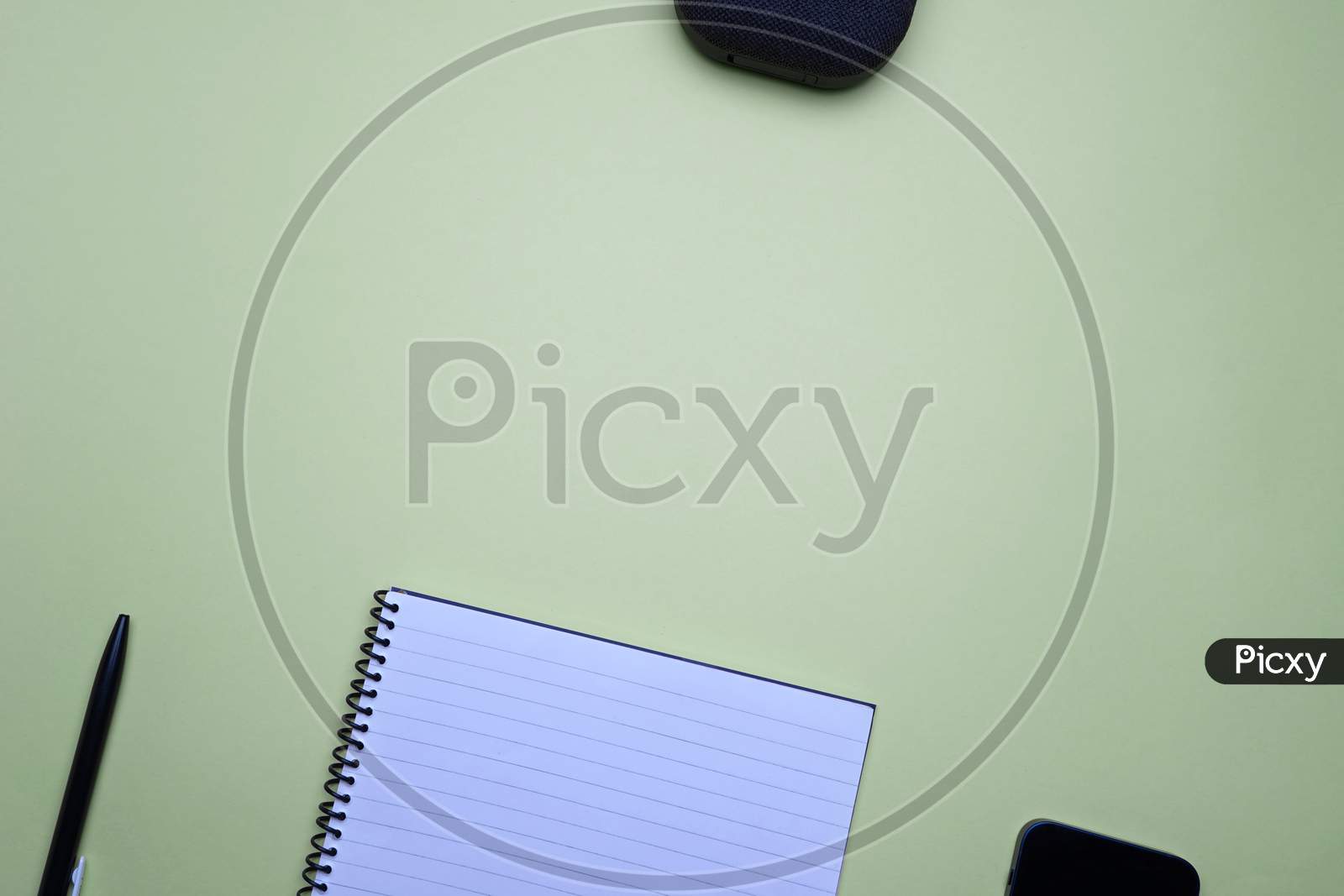 Business, Office, Student, Education Flat Lay, Table Top. Pen And Laptop On Green Background