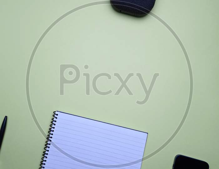 Business, Office, Student, Education Flat Lay, Table Top. Pen And Laptop On Green Background