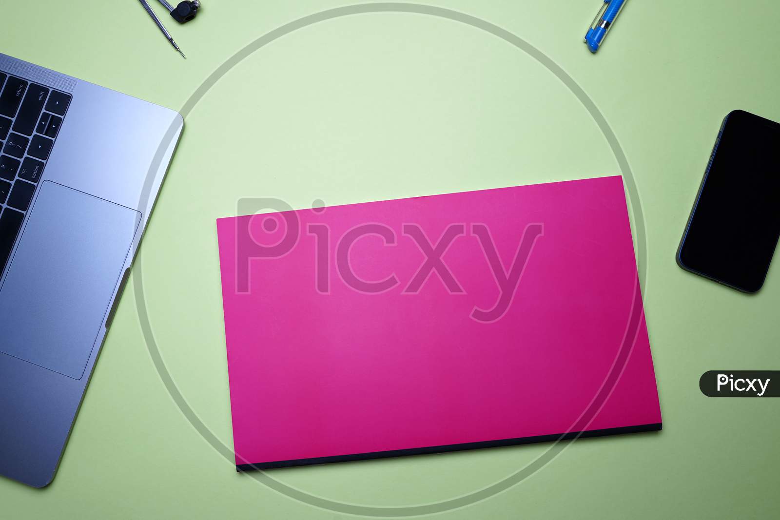 Office Flat Lay, Business, Student And Homework. Laptop, Compass, Pen And Notebook On Green Background