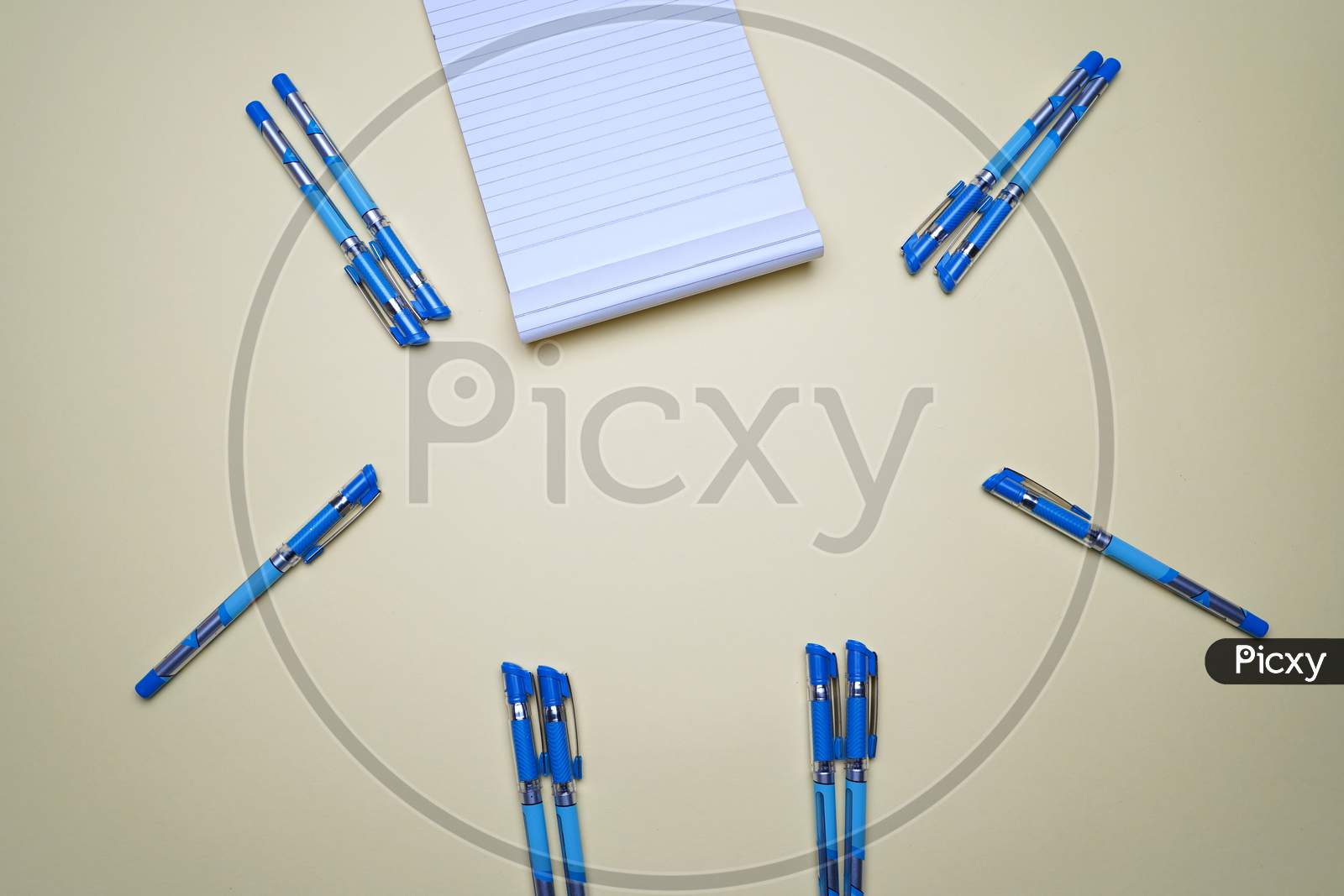 Business, Office, Student, Education Flat Lay, Table Top. Notepad And Pen On Yellow Background