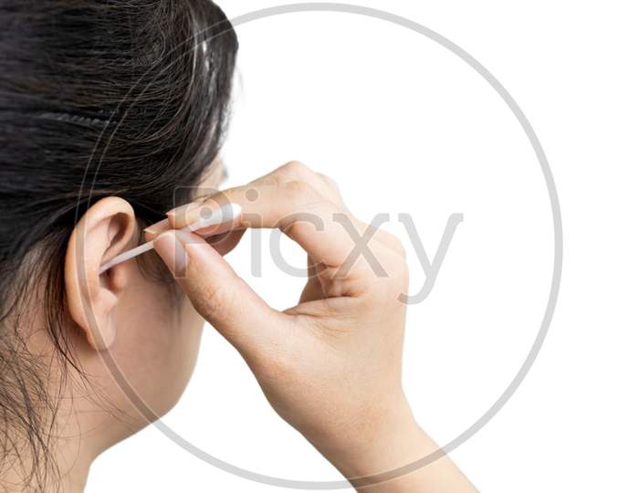 woman with an itchy ears cleaning,removing the earwax in her auditory canal,lady girl using a cotton swab to clean her ear after taking a shower,concept of perforated eardrum from ear picking