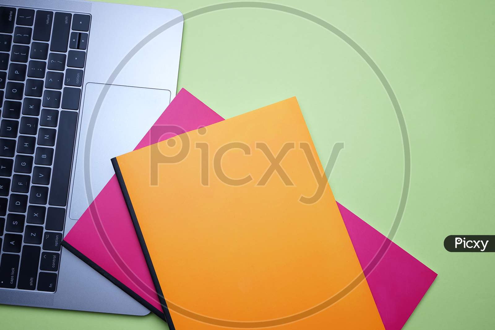 Business, Office, Student, Education Flat Lay, Table Top. Laptop, Colorful Notebook On Green Background