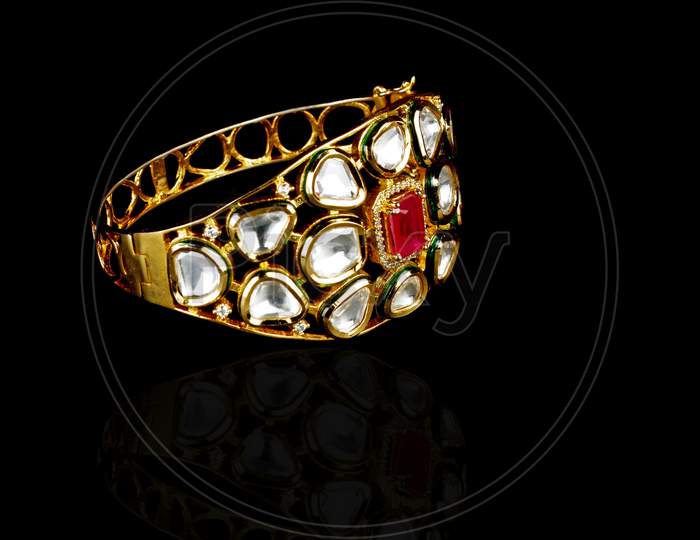 Gold Bracelet On Black Background,Kundan Bracelet,Style, Fashion And Design Of Jewelry. Indian Traditional Jewellery,Indian Wedding Jewellery