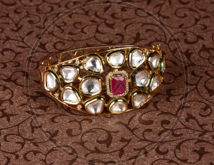 Gold Bracelet On Textured Background,Kundan Bracelet,Style, Fashion And Design Of Jewelry. Indian Traditional Jewellery,Indian Wedding Jewellery