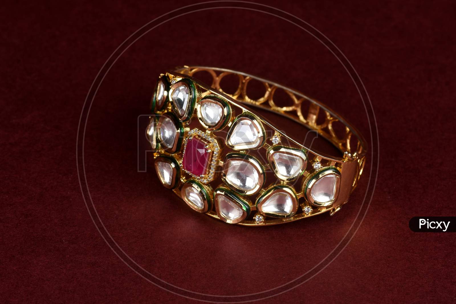 Gold Bracelet On Red Background,Kundan Bracelet,Style, Fashion And Design Of Jewelry. Indian Traditional Jewellery,Indian Wedding Jewellery