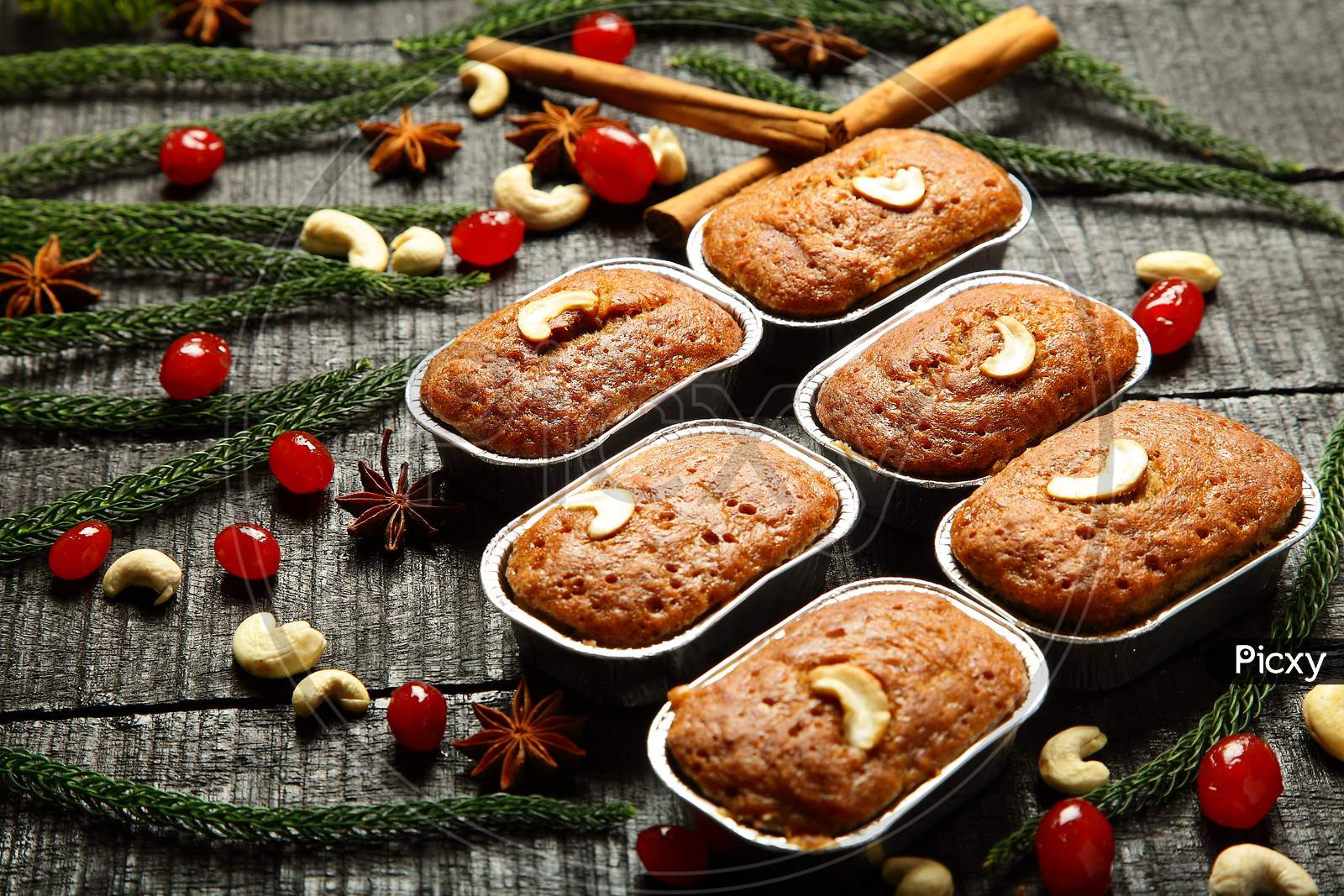 Christmas cakes on a holidays background.