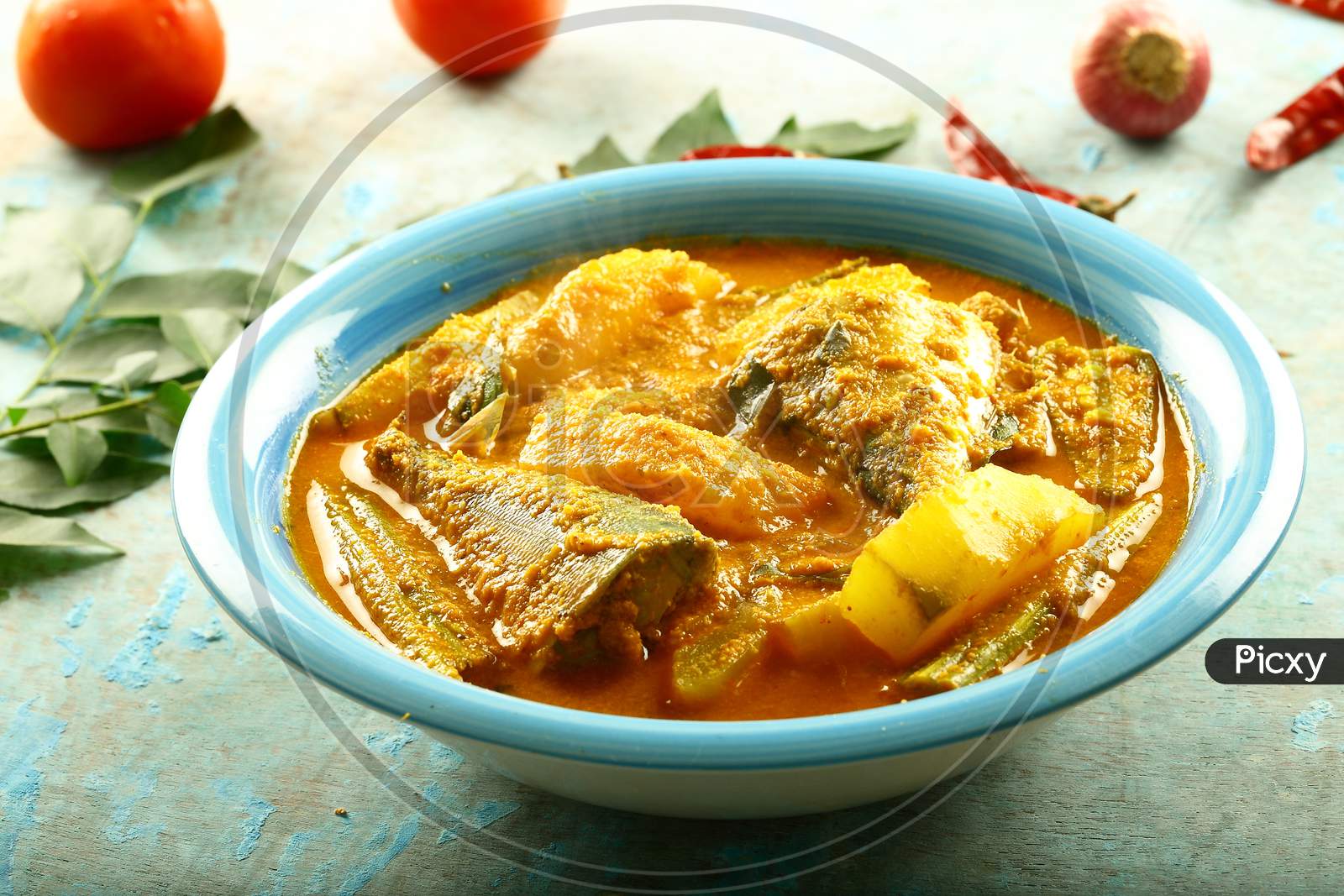 Indian fish curry with mango.