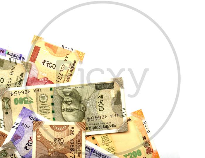 New Indian Money Over White Isolated Background, Indian Currency, Rupee, Indian Rupee,Indian Money, Business, Finance, Investment, Saving And Corruption Concept - Image