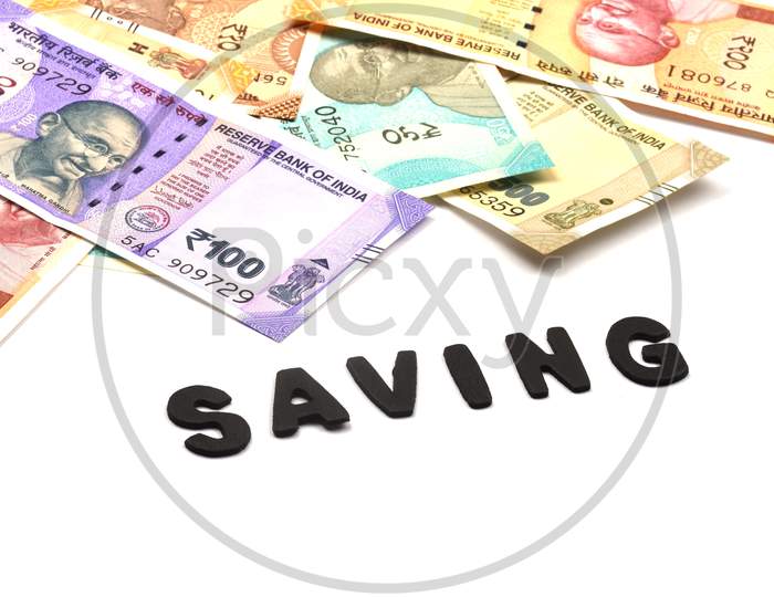 Saving Money Concept,Saving Alphabet On Money Background,Indian Currency, Rupee, Indian Rupee,Indian Money, Business, Finance, Investment, Saving And Corruption Concept - Image