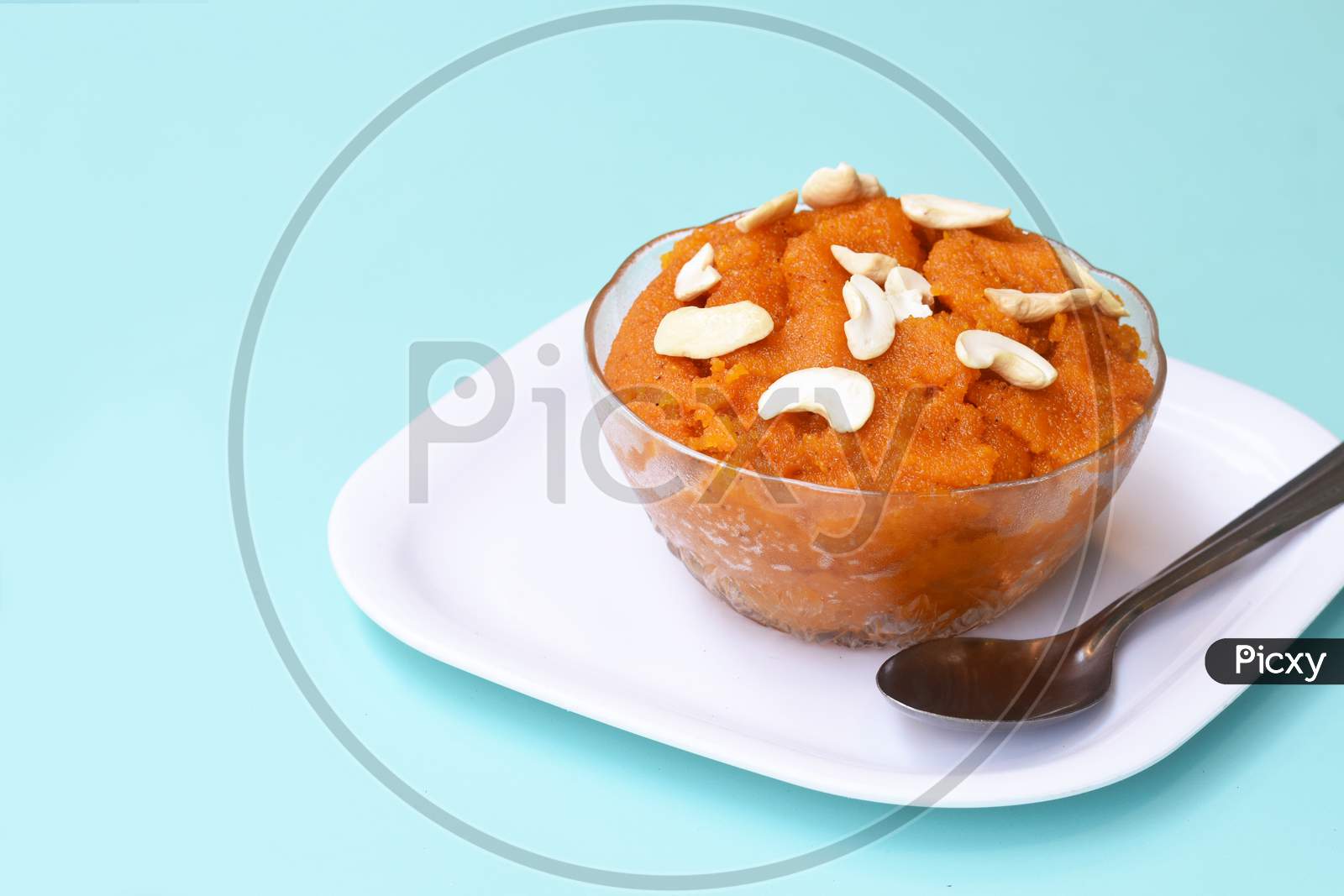 Indian Traditional Sweet,Plain Semolinasuji Halwa Also Known As Sweet Rava Sheera Or Shira - Indian Festival Sweet Garnished With Dry Fruitsserved In A Plate Or Bowl,Indian Dessert
