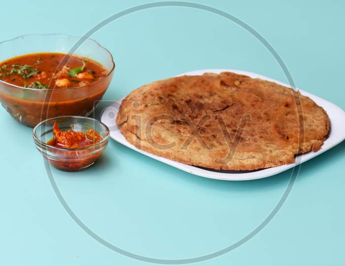 Indian Flatbread - Aloo Kulcha With Choley Or Stuffed Potato Bread Or Stuffed Aloo Paratha With Tomato Ketchup, White Chickpeas & Pickle - Image