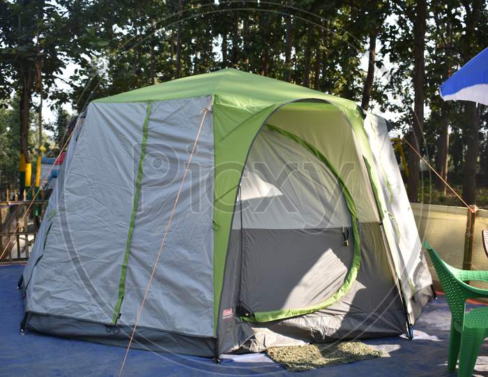 Closeup Image Of A Tent In Between A Forest