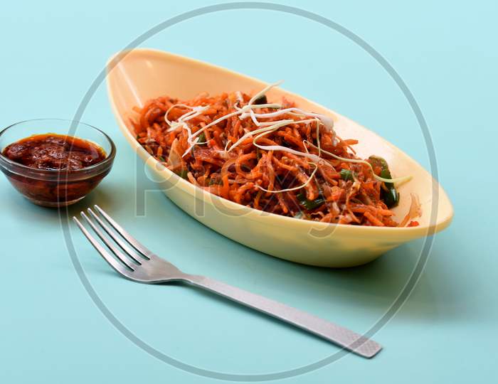 Schezwan Noodles Or Manchurian Hakka Or Vegetable Hakka Noodles Or Chow Mein Is A Popular Indochinese Food Served In A Bowl. Indian Chinese Food, Selective Focus