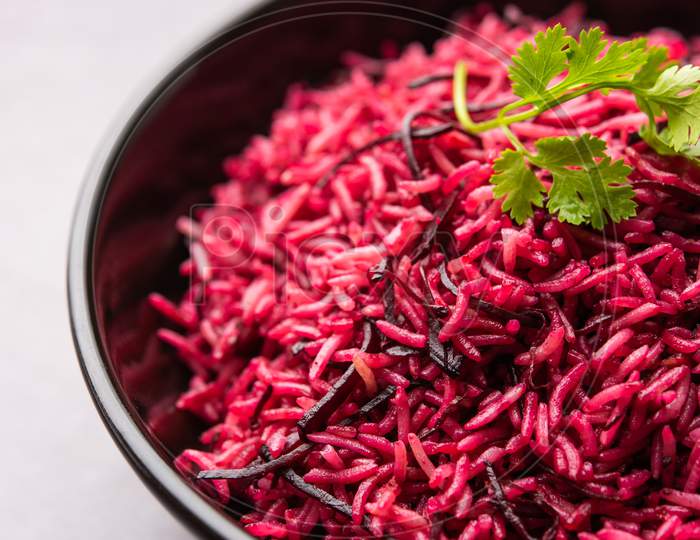 Beetroot Rice Or Pulao Or Pulav Served In A Bowl Or Karahi, Selective Focus. Indian Food