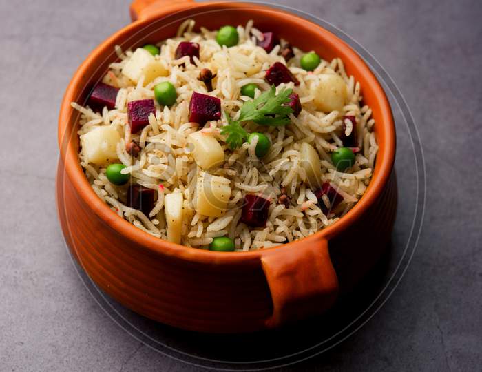 Beetroot Rice Or Pulao Or Pulav Served In A Bowl Or Karahi, Selective Focus. Indian Food