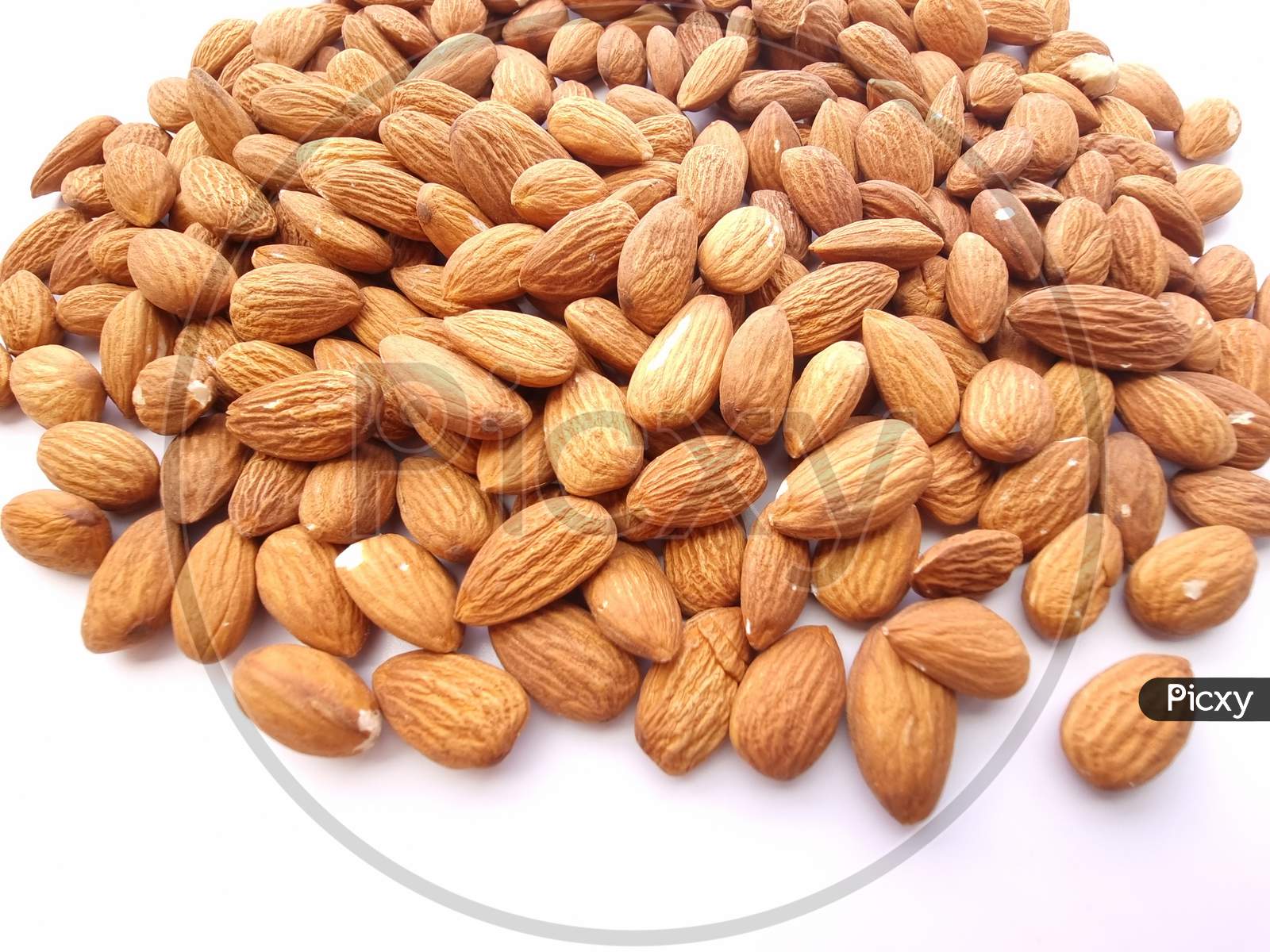 Premium Photo | Badam almond plate nuts variety almonds in a bowl HD 8K  wallpaper Stock Photographic Image