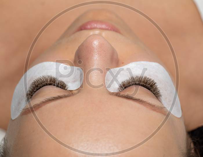 Woman Eyes With Long Eyelashes Extension And Eyepatch Under Eyes. False Lashes.