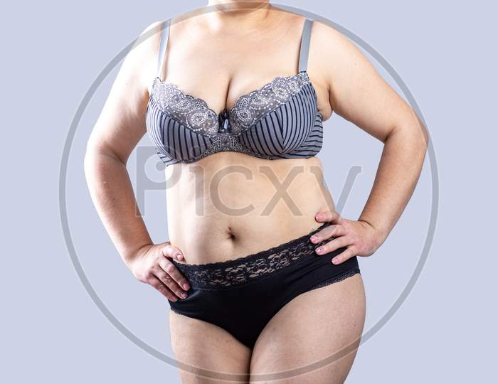 Image of Natural Real Body Plus Size Woman In Lingerie Showing Fat