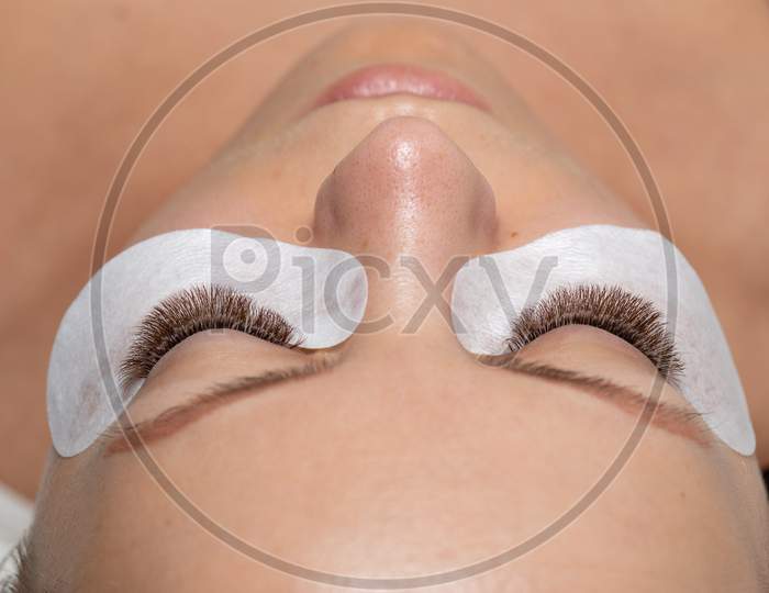 Woman Eyes With Long Eyelashes Extension And Eyepatch Under Eyes. False Lashes.