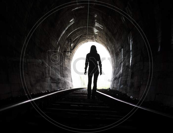 Person At End Of Tunnel
