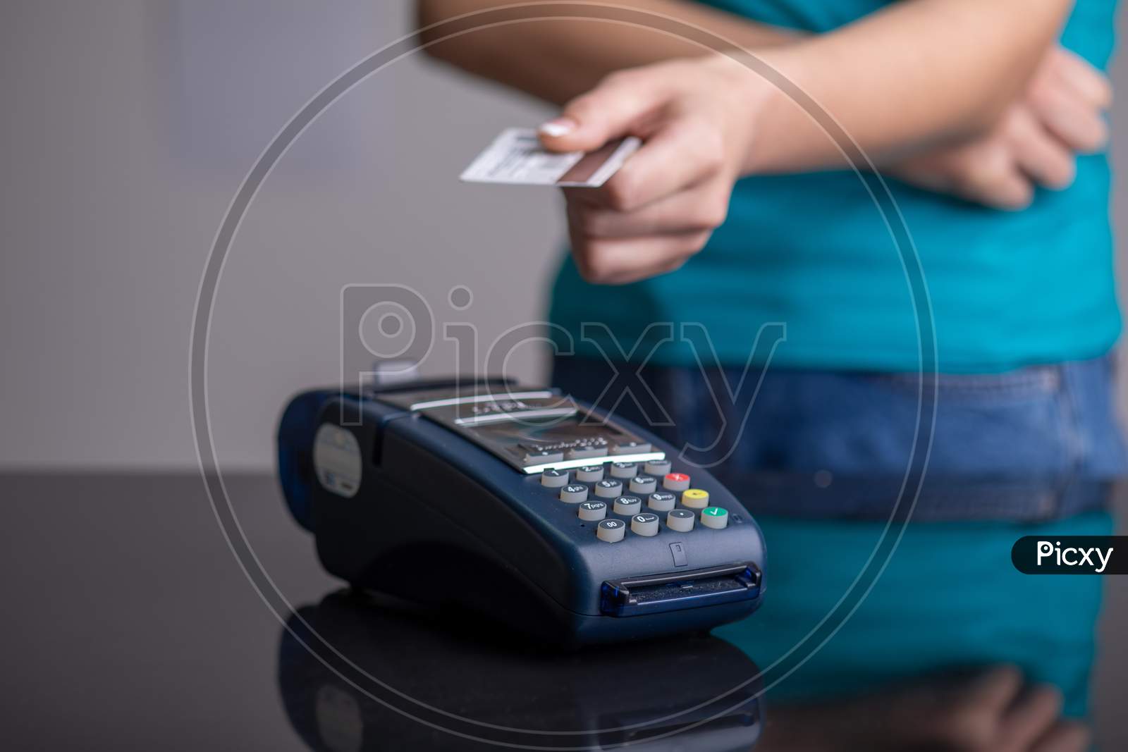 Contactless Payment With Pos Terminal Using Credit Card Stock Photo