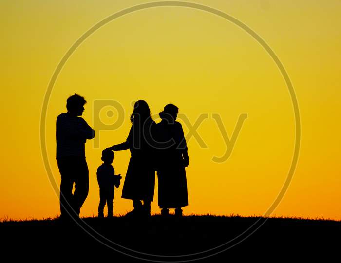 Silhouette Image Of Two-Family Family