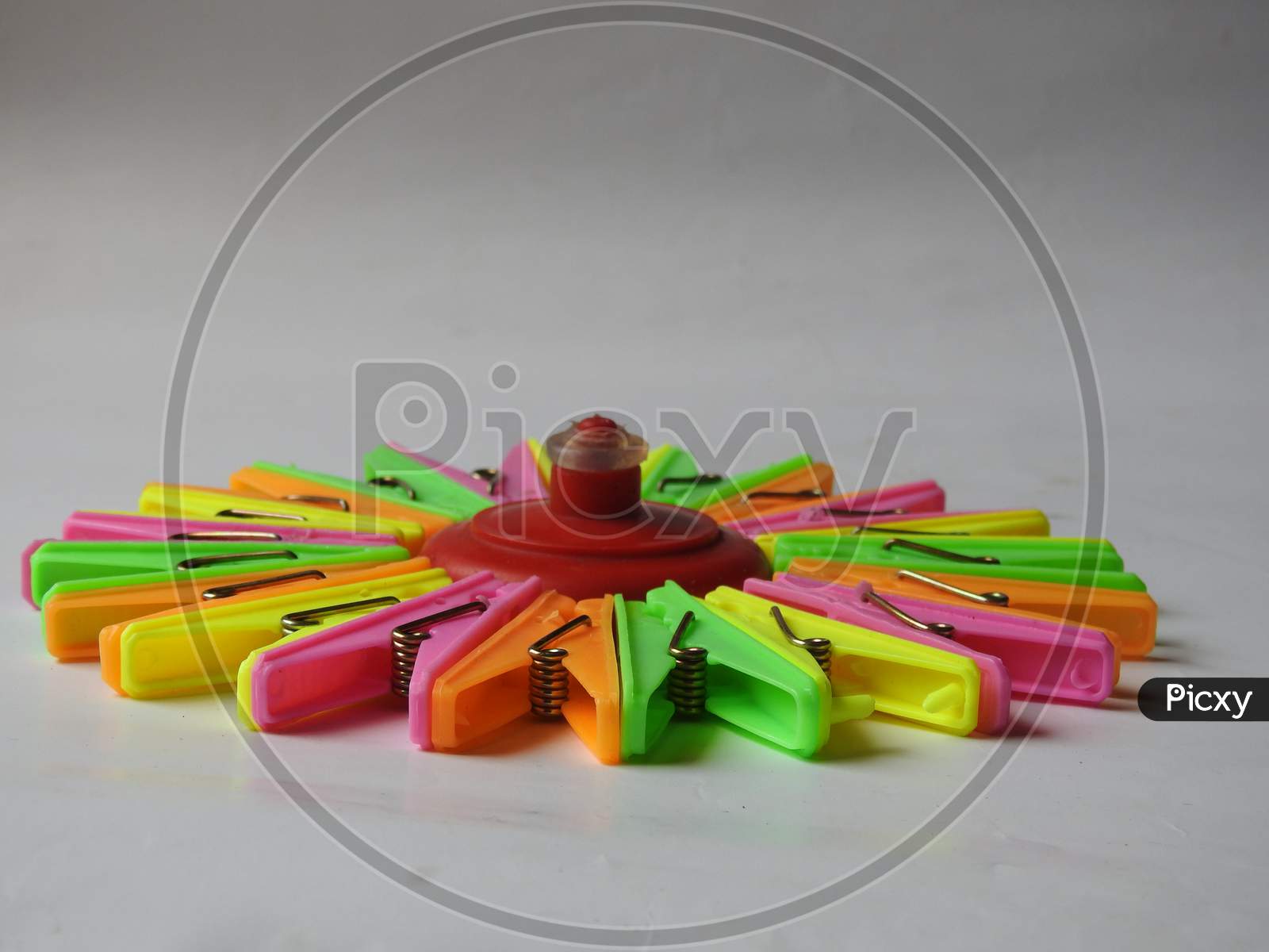 various color background of Cloth hanging plastic clips isolated on white background
