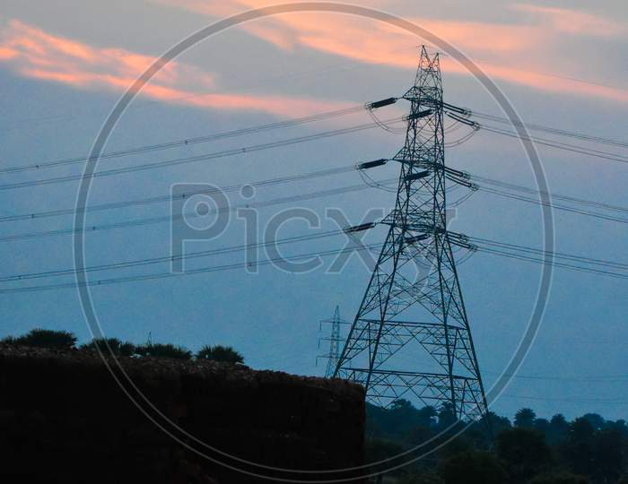 Electric Tower With orange and Blue sky
