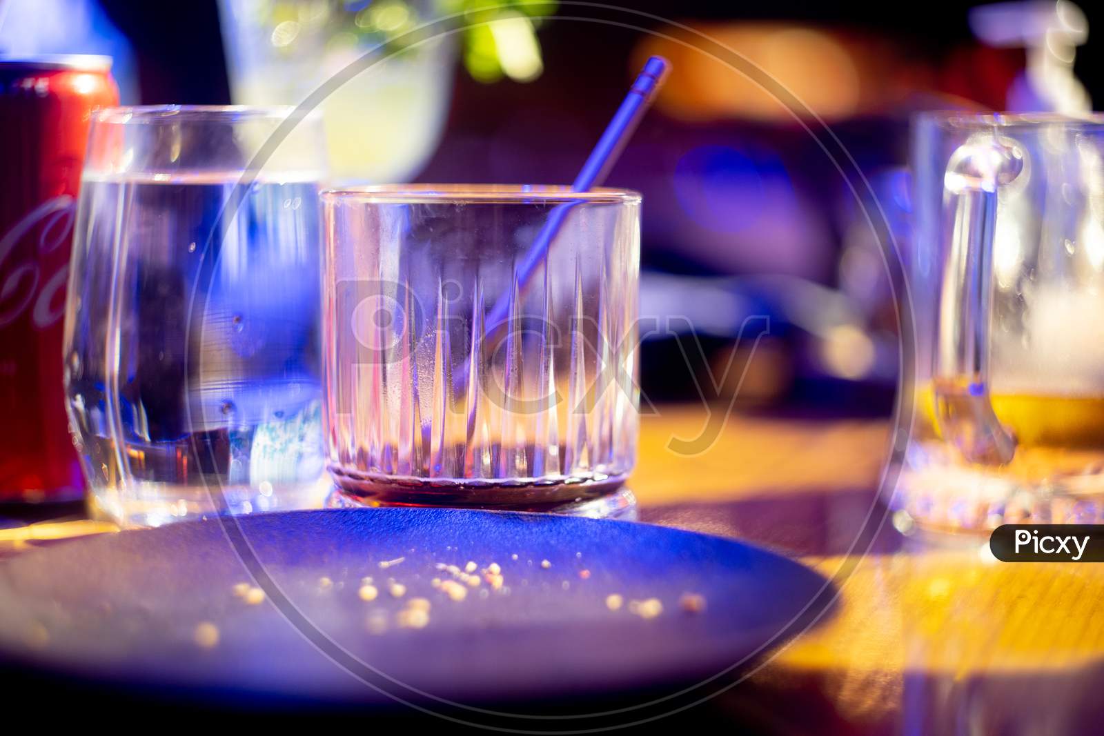 Shot Of Whiskey With Soda Fizzing Bubbling In An Elegant Glass With Out Of Focus Food Items All Around And Bokeh Balls Of Lights Showing The Serving Of Alcohol Liquor As Bars Clubs Open Up Post The Coronavirus Covid 19 Lockdown In Delhi Gurgaon