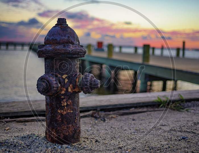 Rusty hydrant in sea side