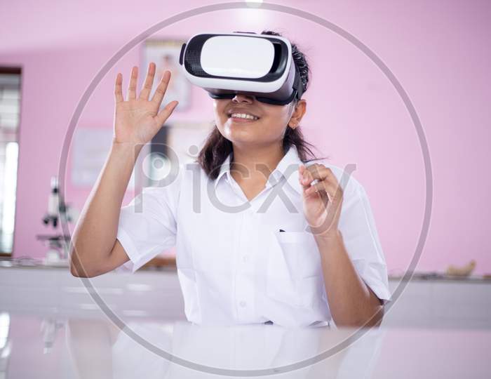 Girl wearing VR  virtual reality goggles interaction headset ,