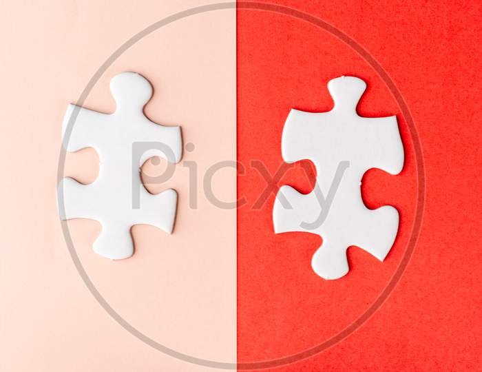 Two Pieces Of Jigsaw Puzzle
