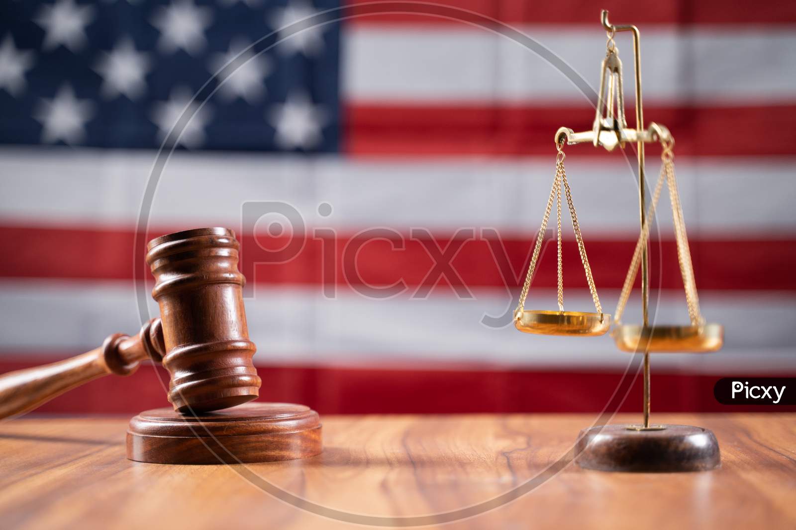 Concept Of Usa Or American Justice System Showing By Using Judge Gavel And Balance Scale On Us Flag As Background