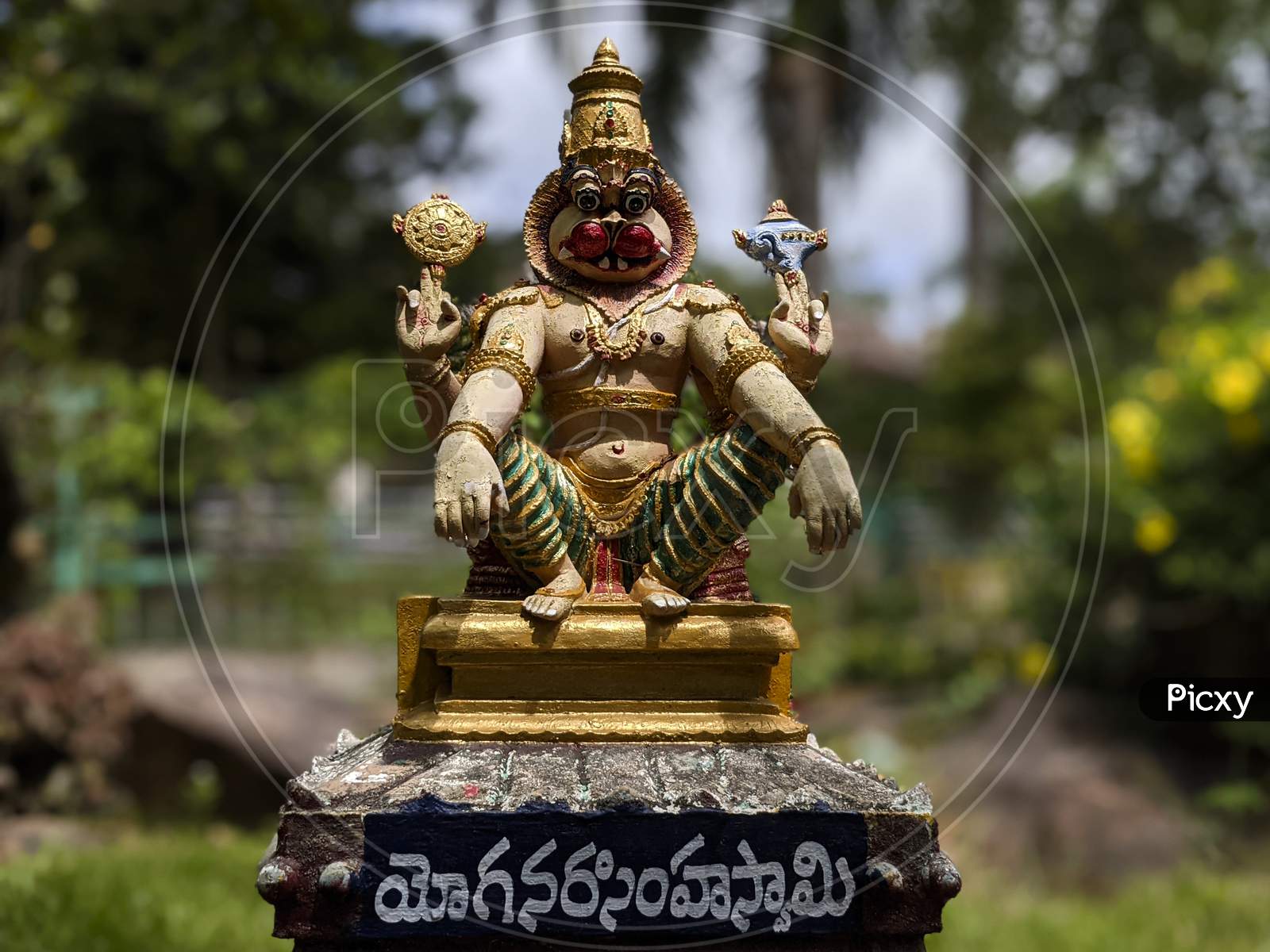 Close View of Lord Sri Yoga Narasimha Swamy idol isolated in Natural Rock Garden in Tirumala