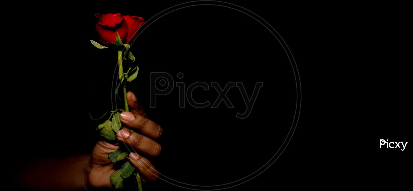 Closeup Of Valentine Candles Isolated On Red Background Stock