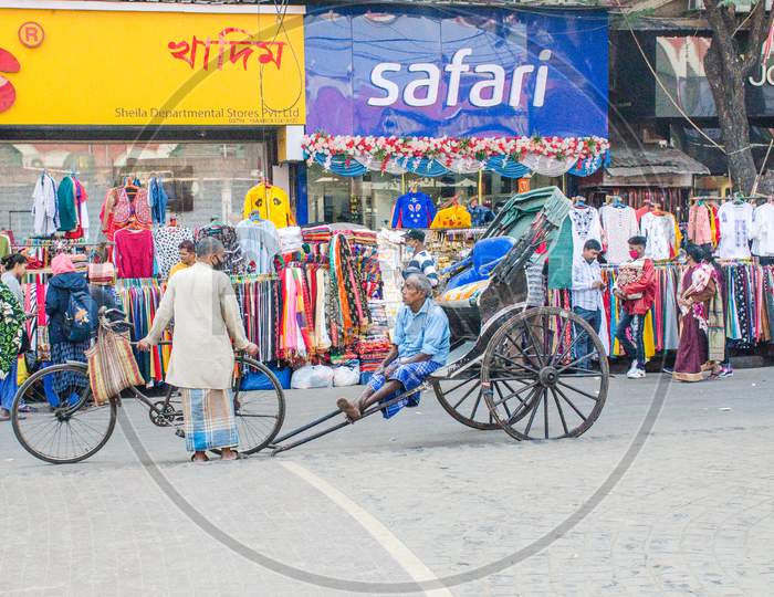 Handpull rickshaw and rickshawman at kolkata west bengal