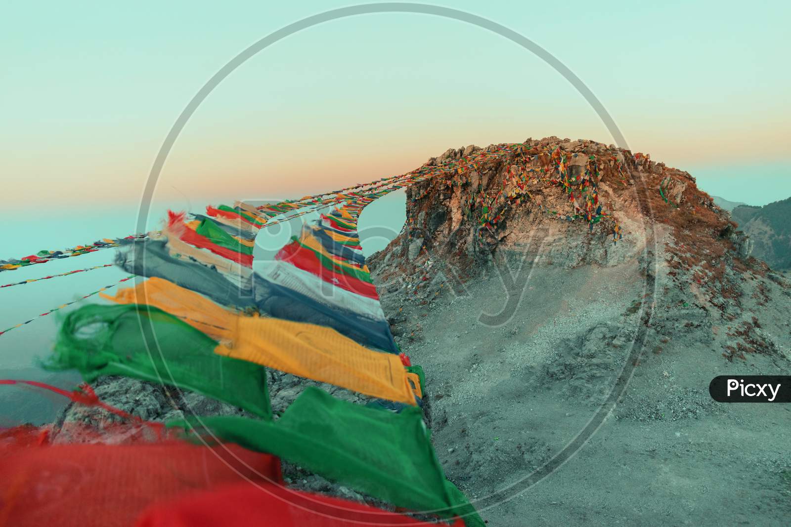 Tibetan flag on a mountain