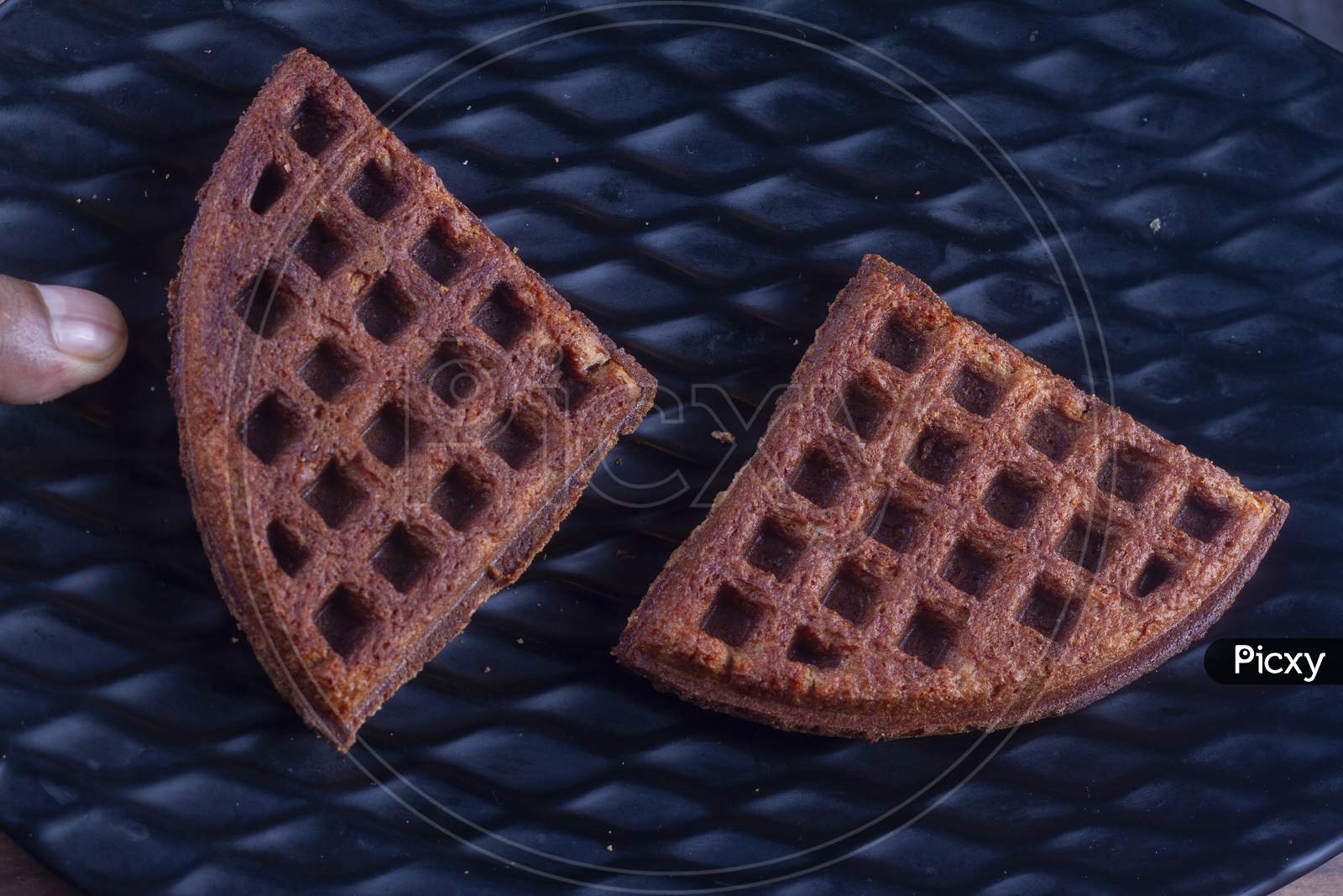 Chocolate Crispy Waffles On Black Background