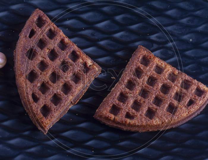 Chocolate Crispy Waffles On Black Background