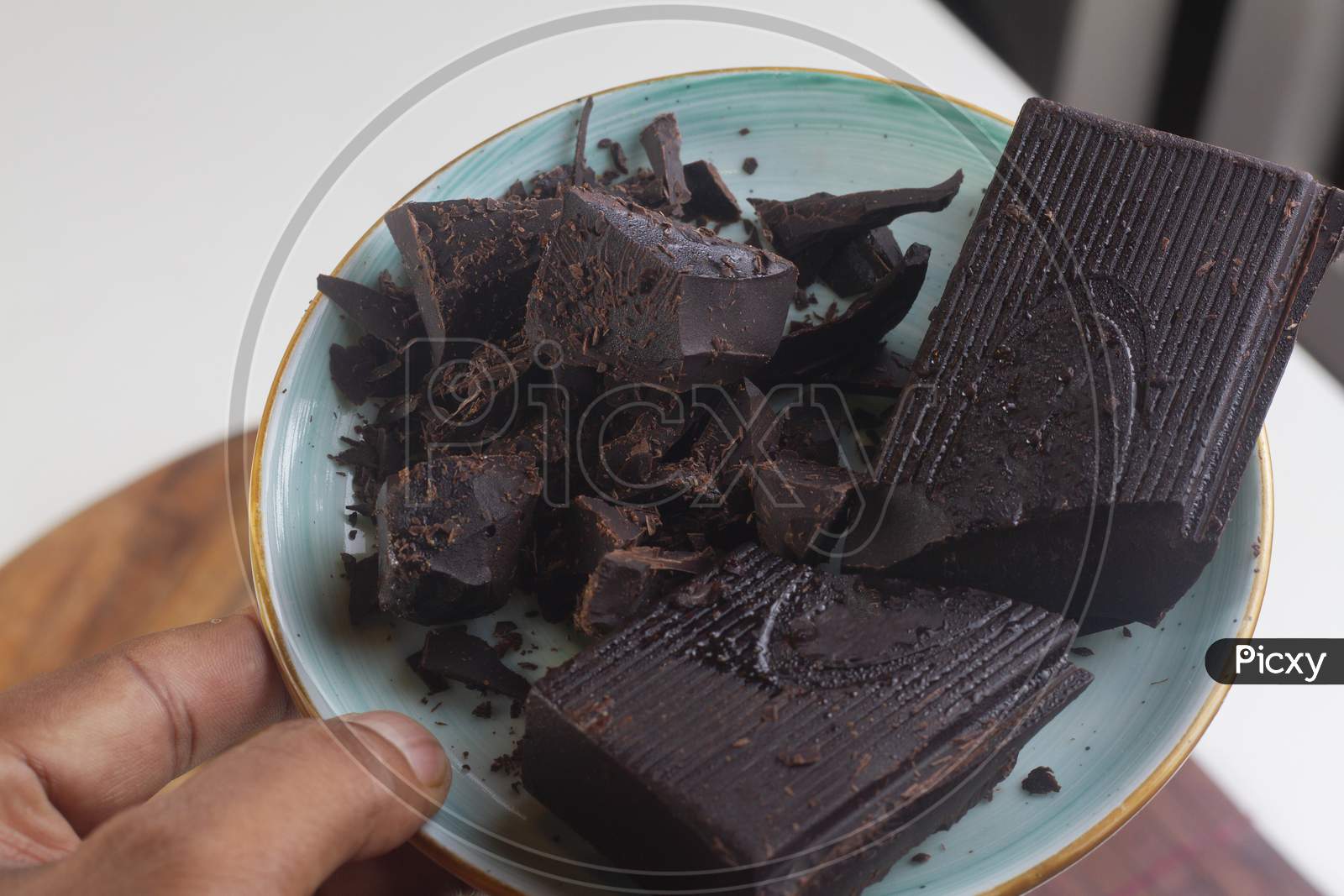 Milk Dark Chocolate Pieces Isolated On Blue Plate From.