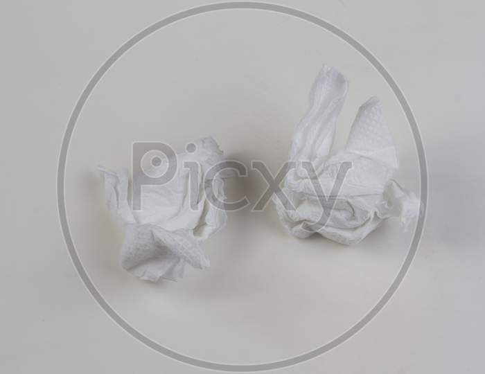 Used Tissue Paper Ball On White Background. Paper Napkin.