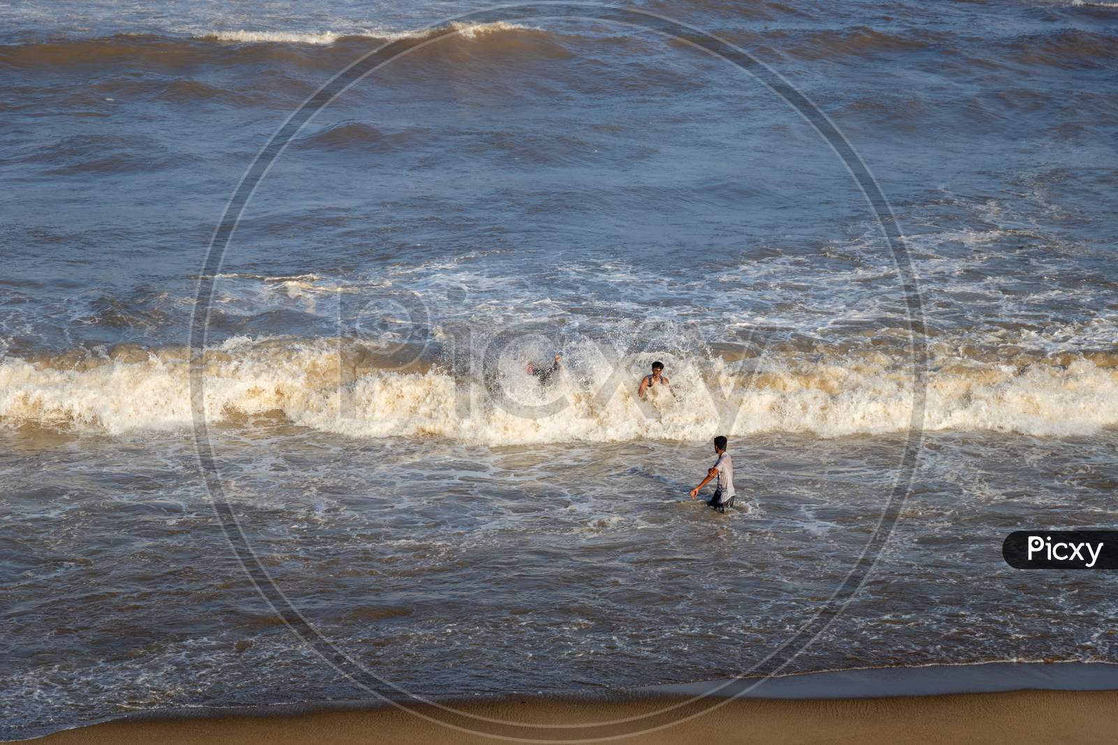 Chennai, Tamil Nadu, India - Pondycherry 21 02 2021: Two Men Playing On Water In The Beach